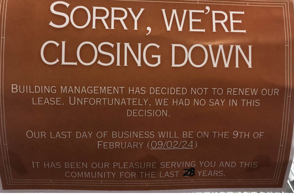 Classic Bakery is displaying a closing down sign.